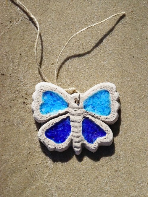 Small Blue Butterfly garden ornament close up