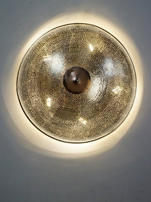 Dome hand punched Egyptian close to ceiling light dots