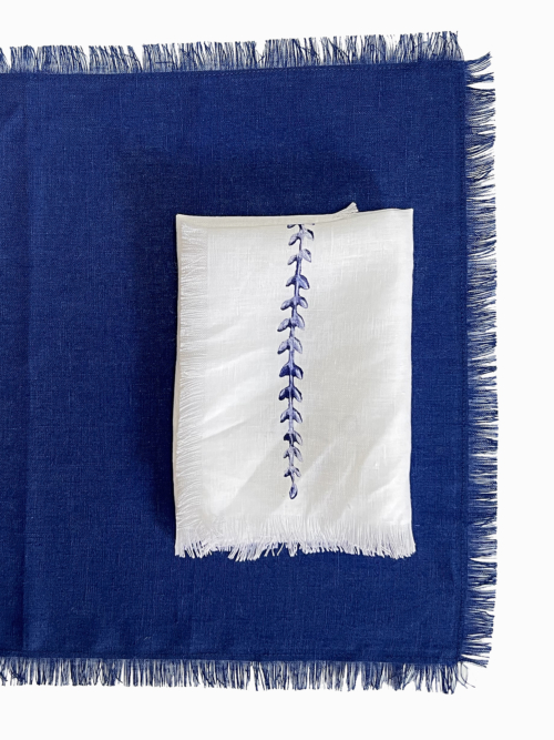 blues wheat in a line frayed french linen napkin folded